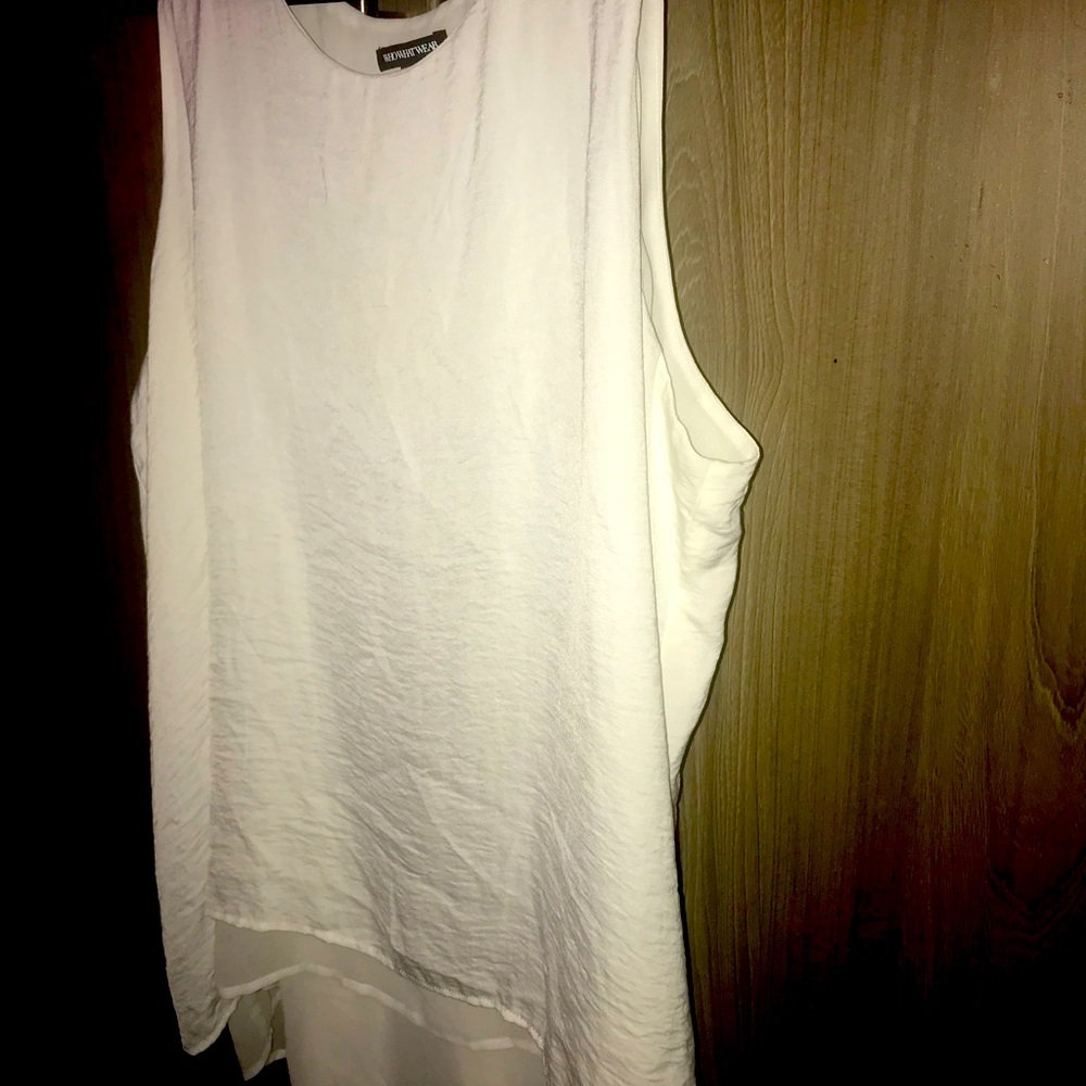 White sleeveless blouse-flowy.